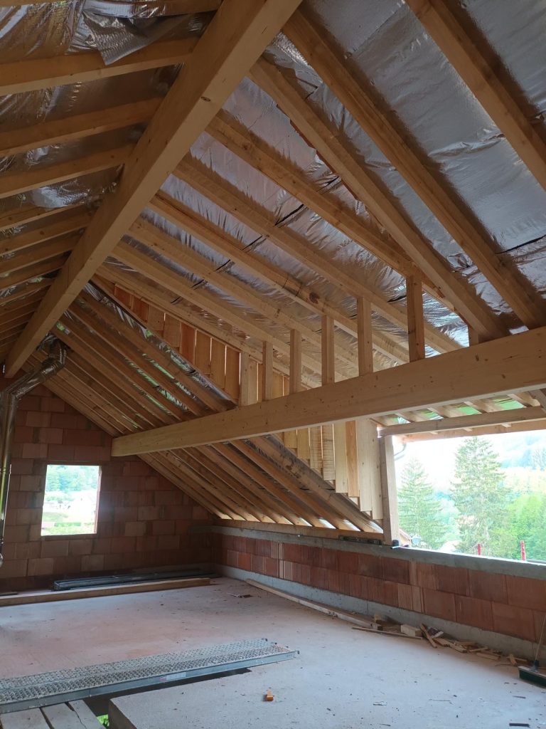 Rénovation d’une maison : création d’une charpente moderne et bardage bois à Wittenheim (68)